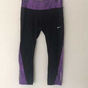 Black with purple Nike compression capris
